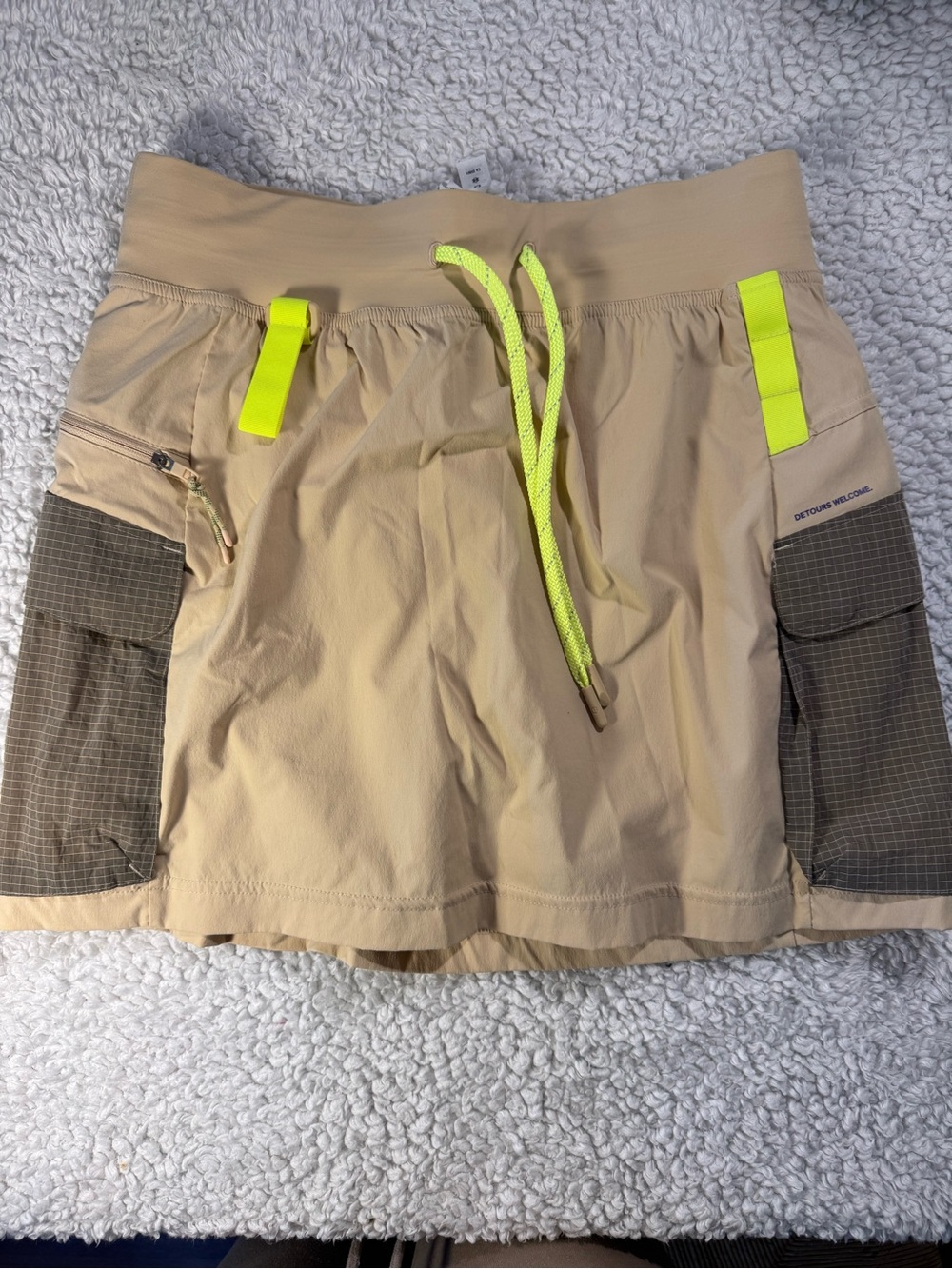 Tan with neon accents woman’s hiking athletic Lululemon skort size 8